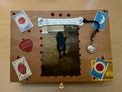 A memory box with special relics honoring Jester, a very special pooch