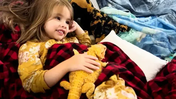 a girl and her bearded dragon